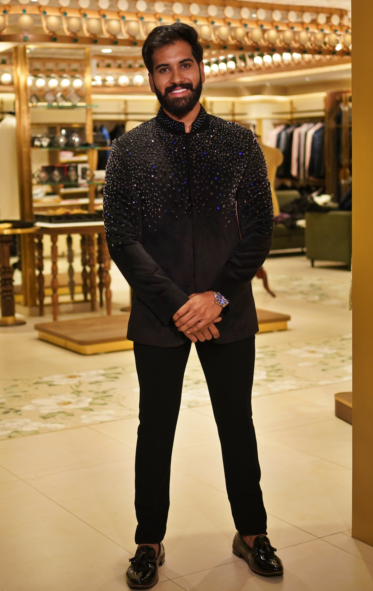 The Sharavathi Jodhpuri in black with intricate multicolour embellishment and structured bandhgala collar